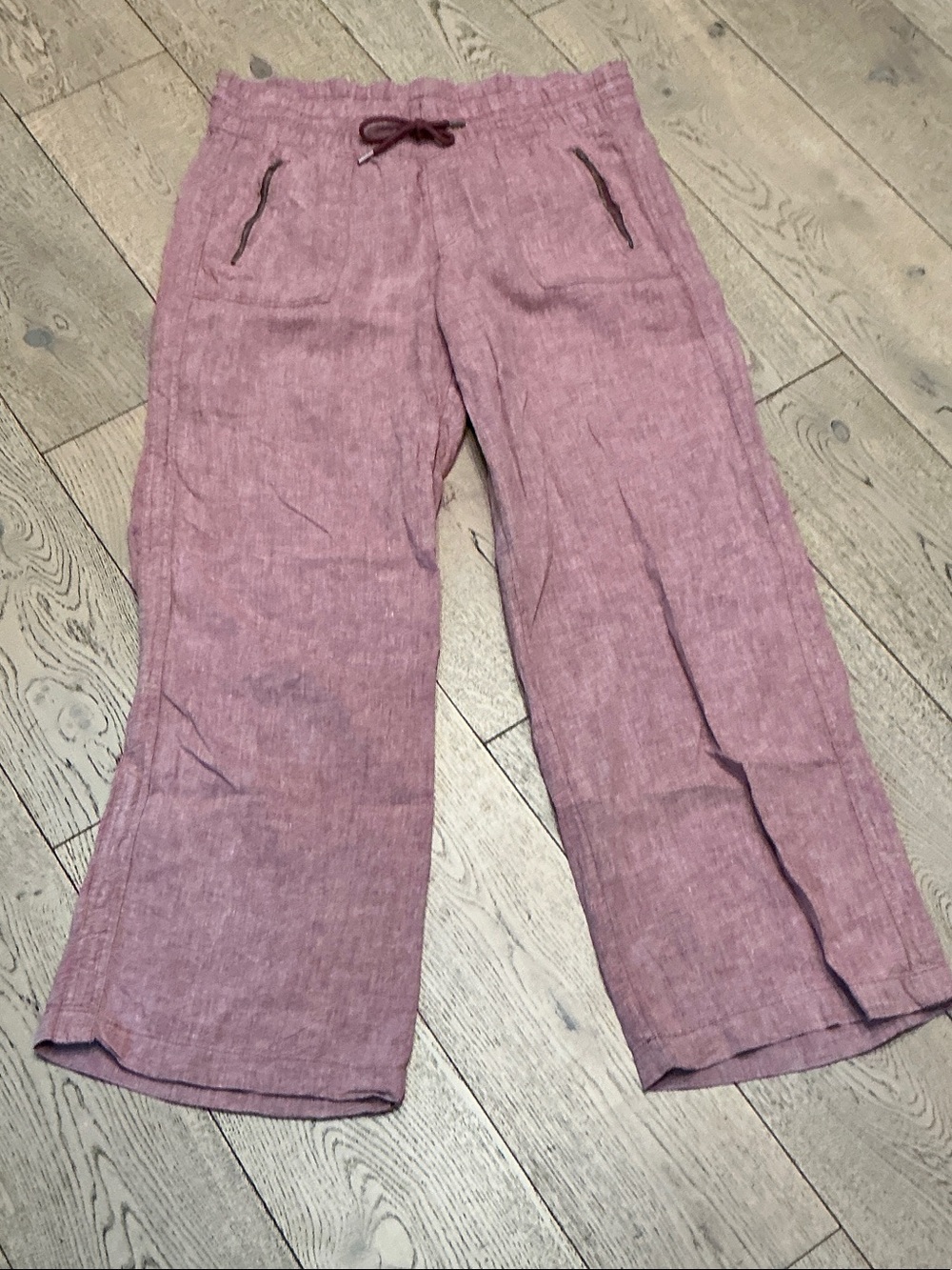 Woman’s Athleta red linen long pants. Size 14Tall. Front zipper pockets.Like new